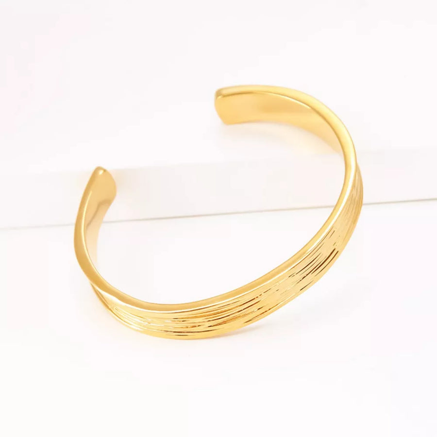 bracelet featuring textured in gold with 18K Gold-Plated, Copper Care instructions: Avoid wearing during exercise, as swe