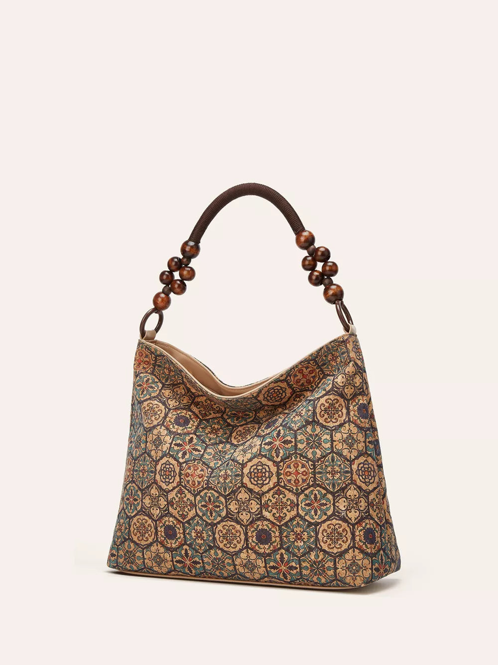 Vibrant bohemian hobo tote in brown with geometric pattern and beaded handle