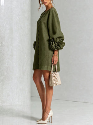 Apricot mini dress with decorative buttons and puff sleeve