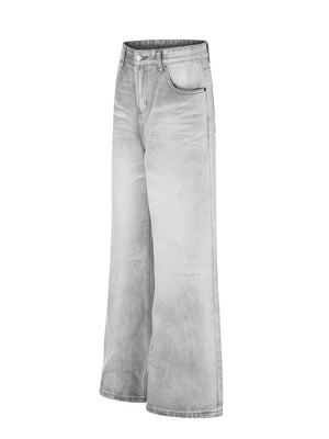 Men's gray vintage wash wide leg jeans with a relaxed fit.