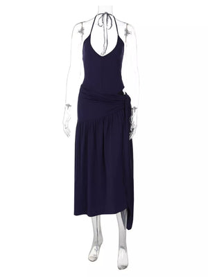 Navy halter neck ruched maxi dress with deep v-neck and tie detail