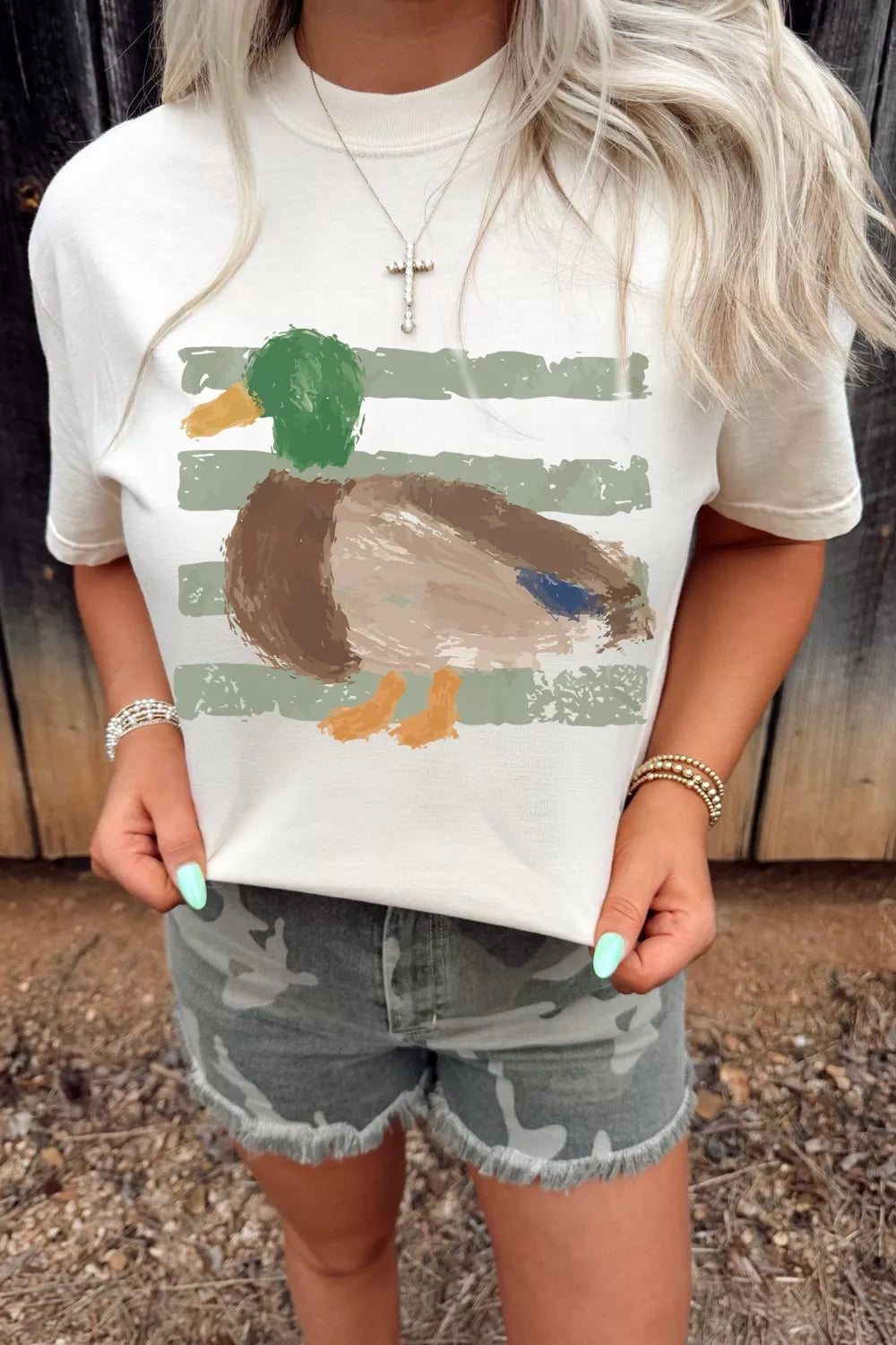 Cream cotton t-shirt with artistic mallard duck graphic and brushstroke stripes