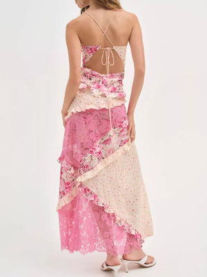Floral lace maxi dress with ruffles in pink and cream floral print, featuring a cutout back and tiered skirt.