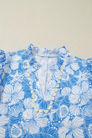 Tropical floral v-neck blouse with frill trim and puff sleeves in blue and white polyester