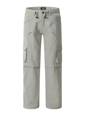 Grey relaxed fit utility cargo pants with multiple pockets and drawstring waist.