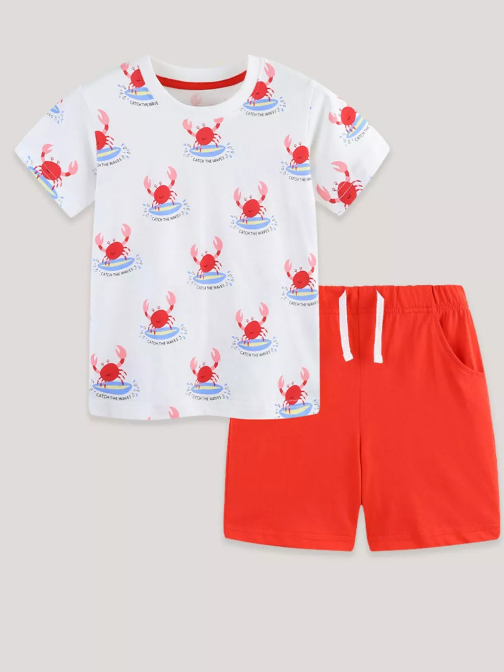 White cotton toddler boys' t-shirt with red crab print and red drawstring shorts.
