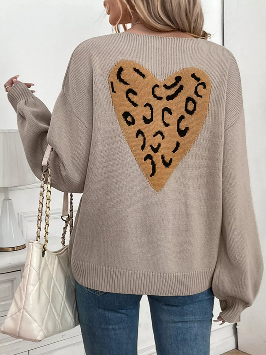 Gray apricot knit cardigan with leopard print heart detail on back.