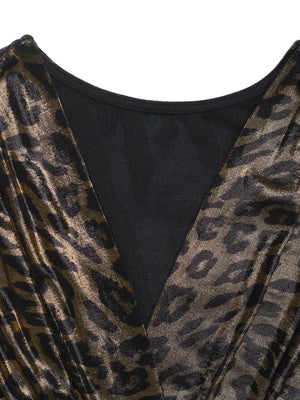 Ruched slit long-sleeve dress in black with a metallic leopard print.