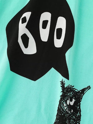 Teal t-shirt with black ghost speech bubble saying BOO and a black monster graphic.