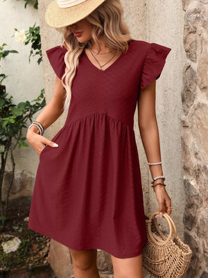 Burgundy a-line dress with ruffled sleeves and v-neck, textured fabric, above knee length.