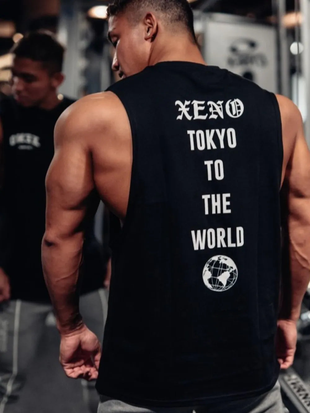 Black Xeno Tokyo graphic muscle tank top with globe detail