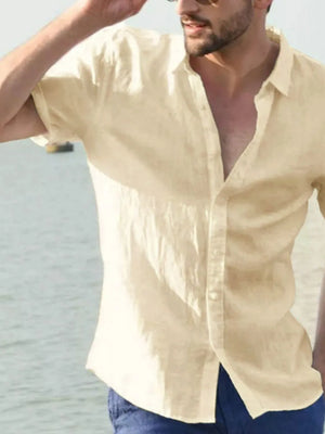 Men's tan linen resort shirt, short sleeve, buttoned, relaxed fit, perfect for summer.