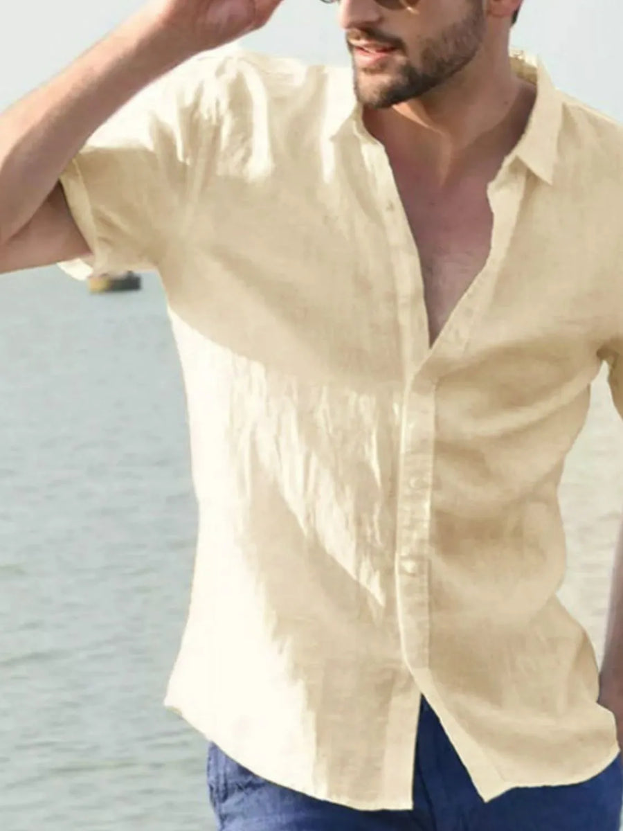 Men's tan linen resort shirt, short sleeve, buttoned, relaxed fit, perfect for summer.