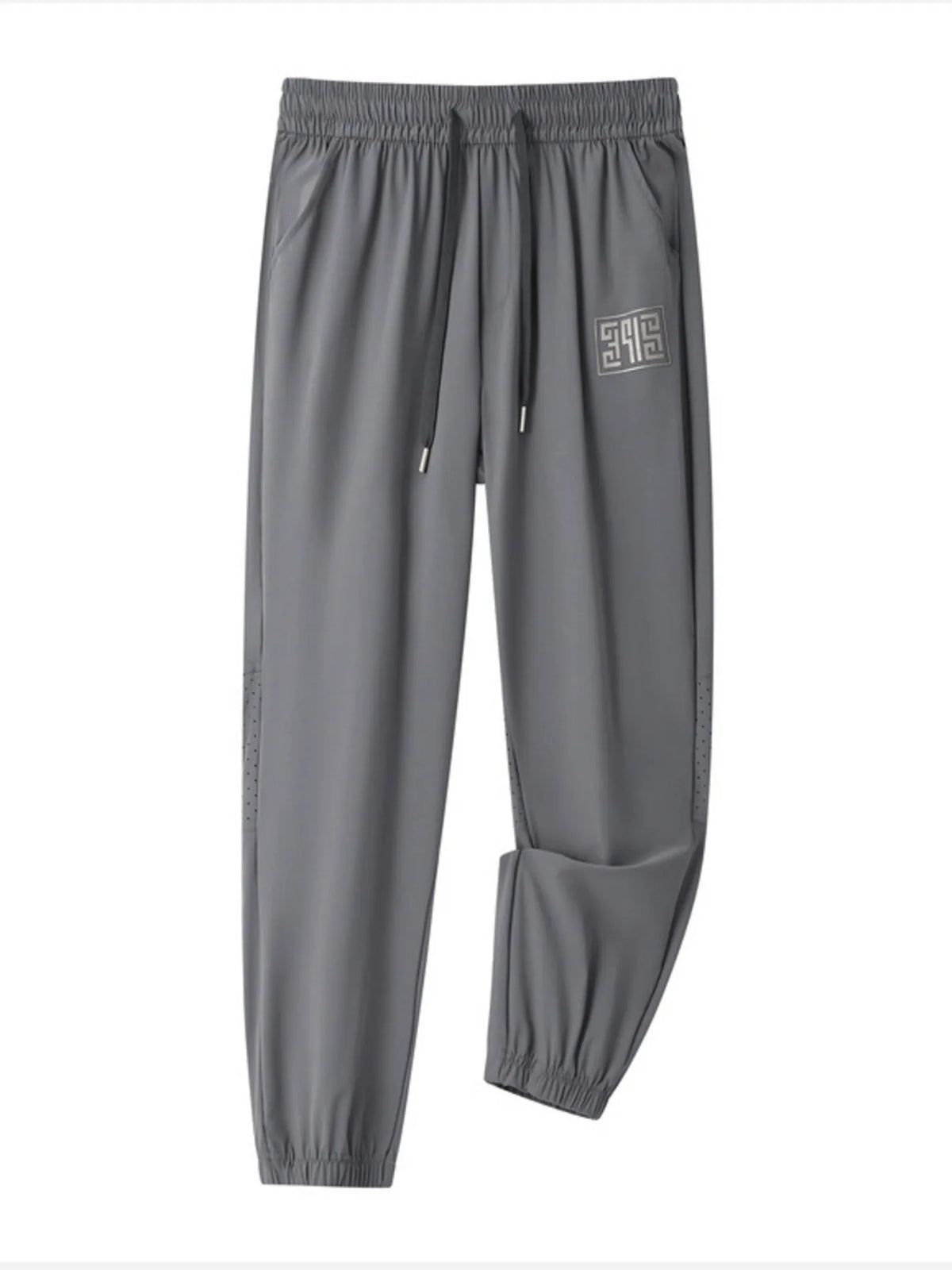 Grey casual drawstring joggers with logo detail and perforated side panels.