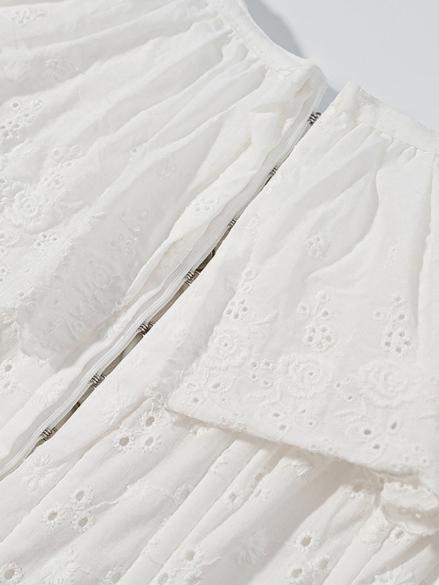 White eyelet tank top with ruffle trim and corset detail