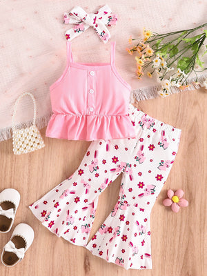 Pink ruffled tank top and white flare pants with bunny and flower print.