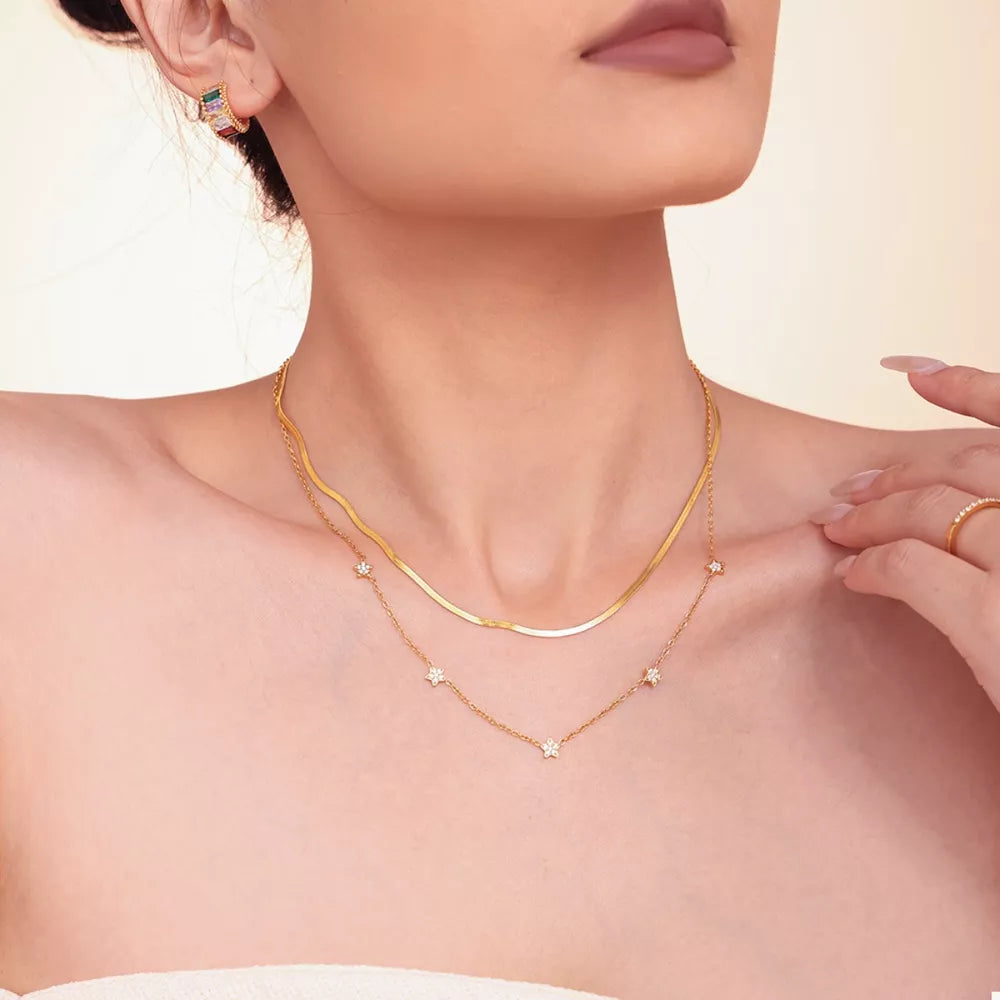 necklace in gold featuring layered and straight fit