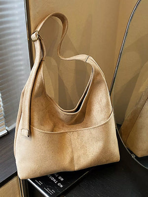 Large Khaki Suede Shoulder Bag with adjustable strap and front pocket detail.