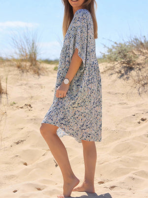 100% polyester Care instructions: Machine wash cold mini dress in sage green with loose silhouette