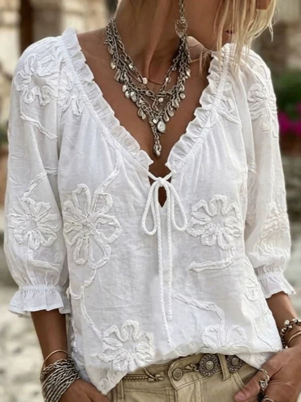 Navy blouse with hip-length and tie