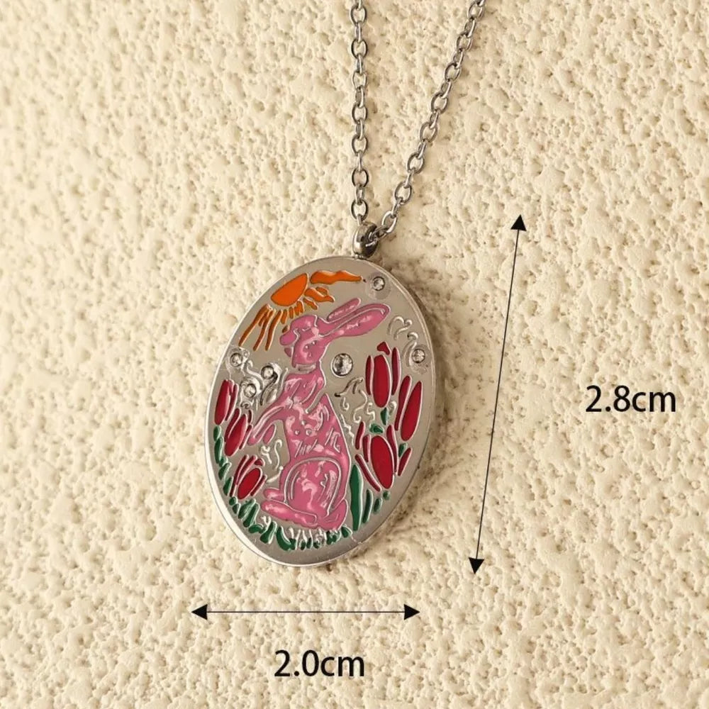 necklace featuring pictorial in Gold A with Platinum-Plated, 18K Gold-Plated, Resin, Stainless Steel, Zircon Care instructio