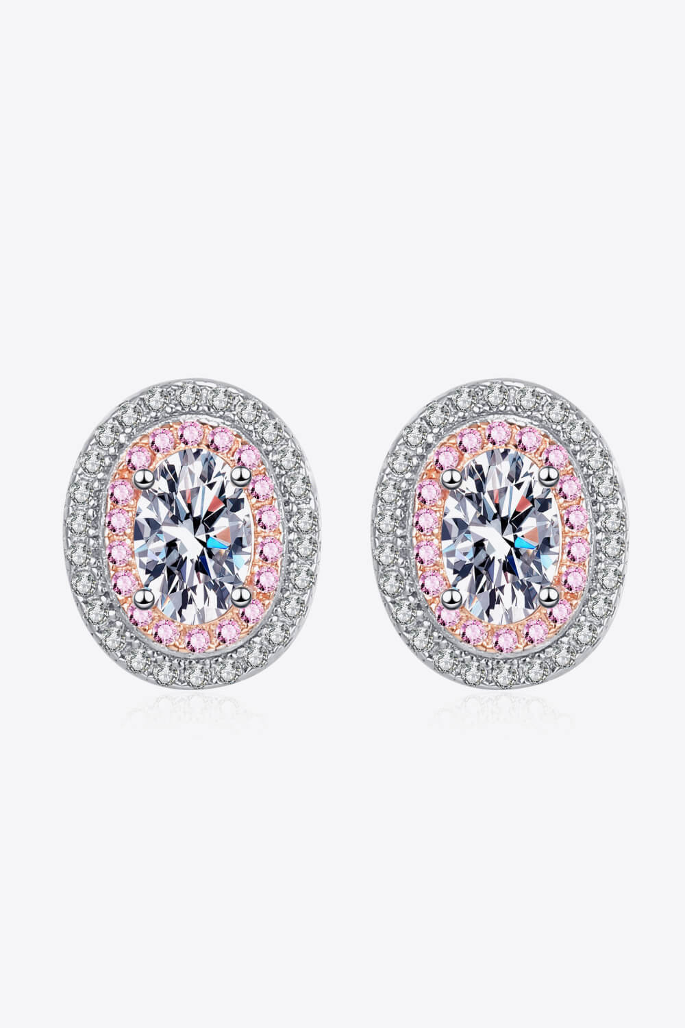Halo moissanite stud earrings with pink accents and white diamond halo.