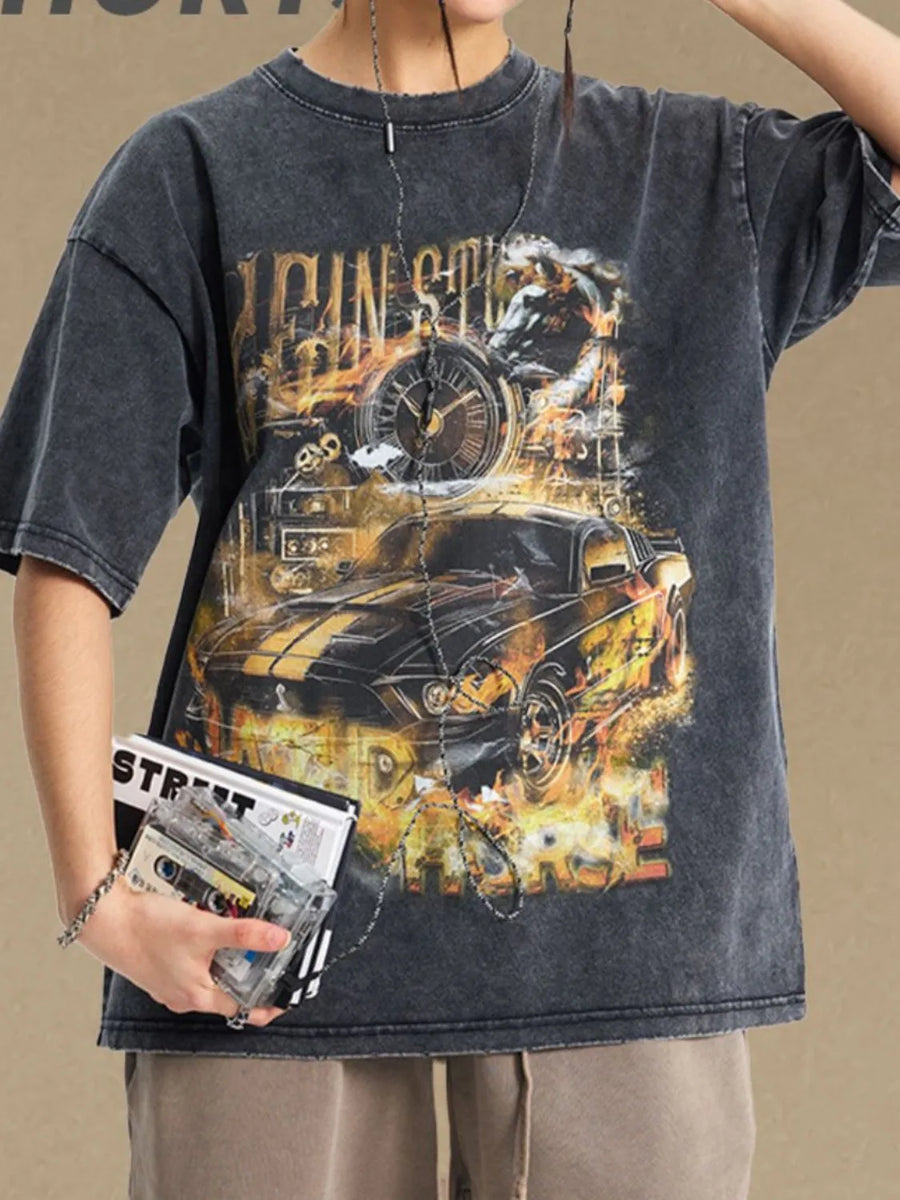 Black vintage wash graphic tee with racing car and fire motif.