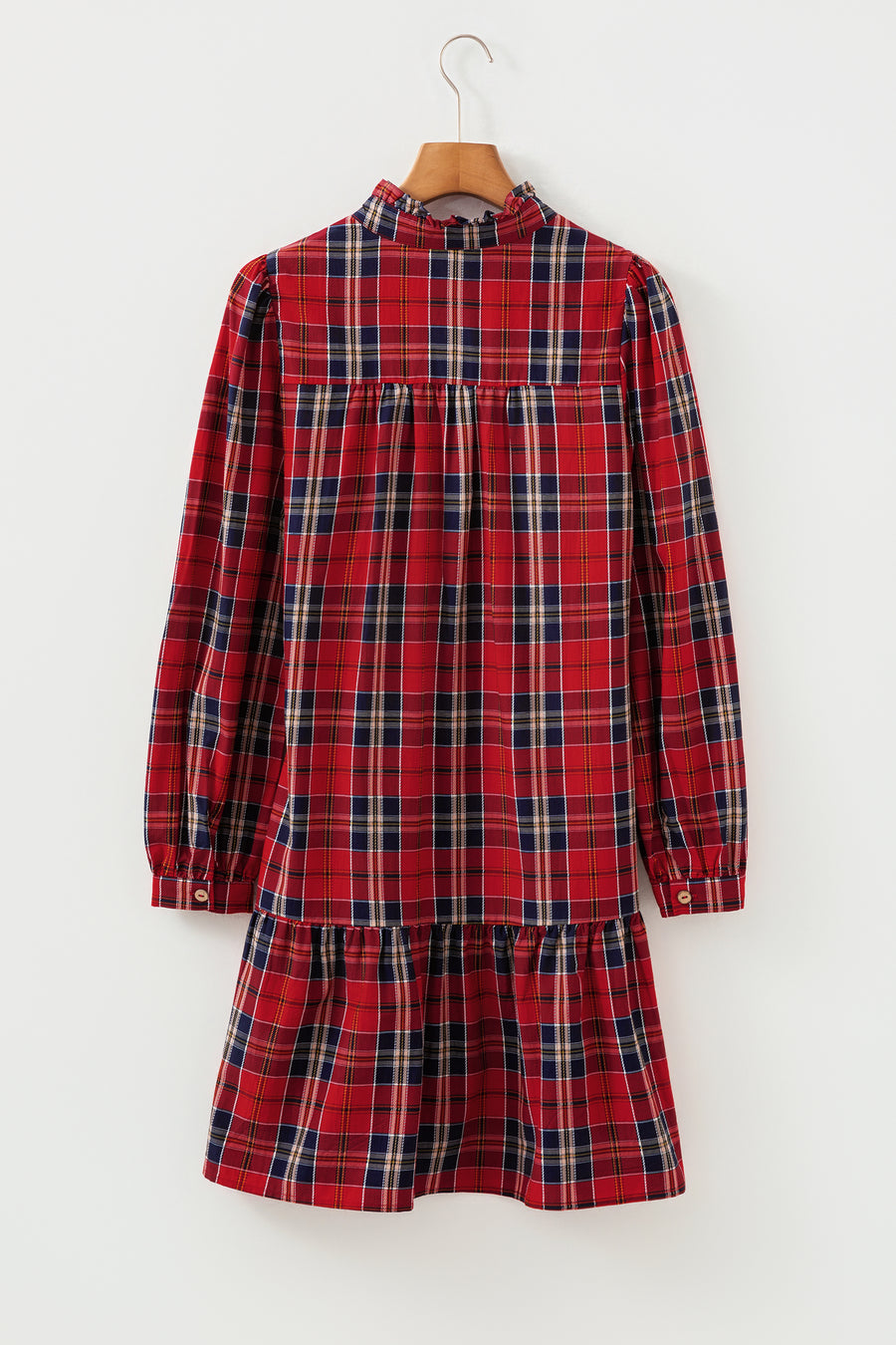 Red tartan mini dress with frilly collar, button-down front, and tiered skirt.