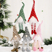 Knitted gnome ornaments in red, green, blush pink, khaki, and gray with striped legs and heart patterns.