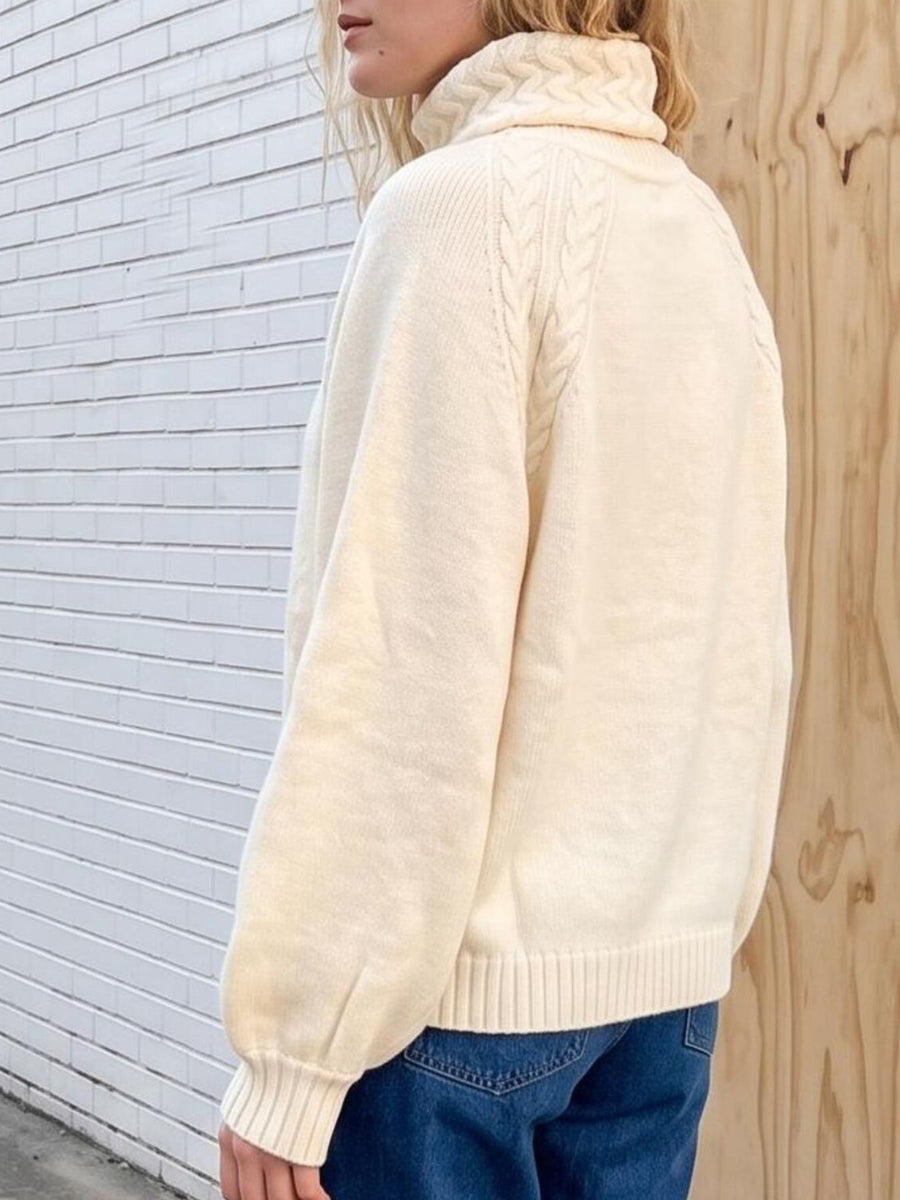 100% acrylic Care instructions: Machine wash cold turtleneck sweater in Cream with regular silhouette