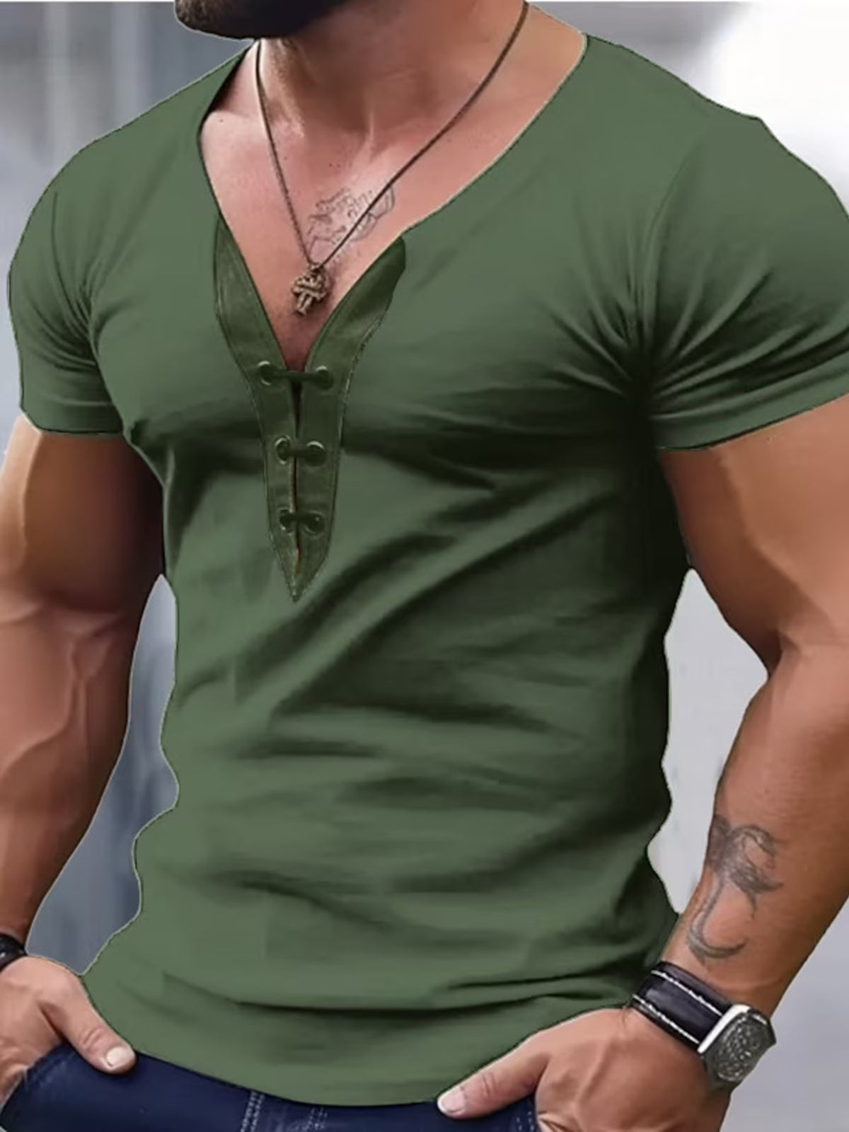 Men's green short sleeve t-shirt with V-neck and button detail