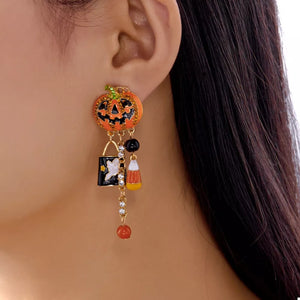 black earrings featuring dangle and novelty