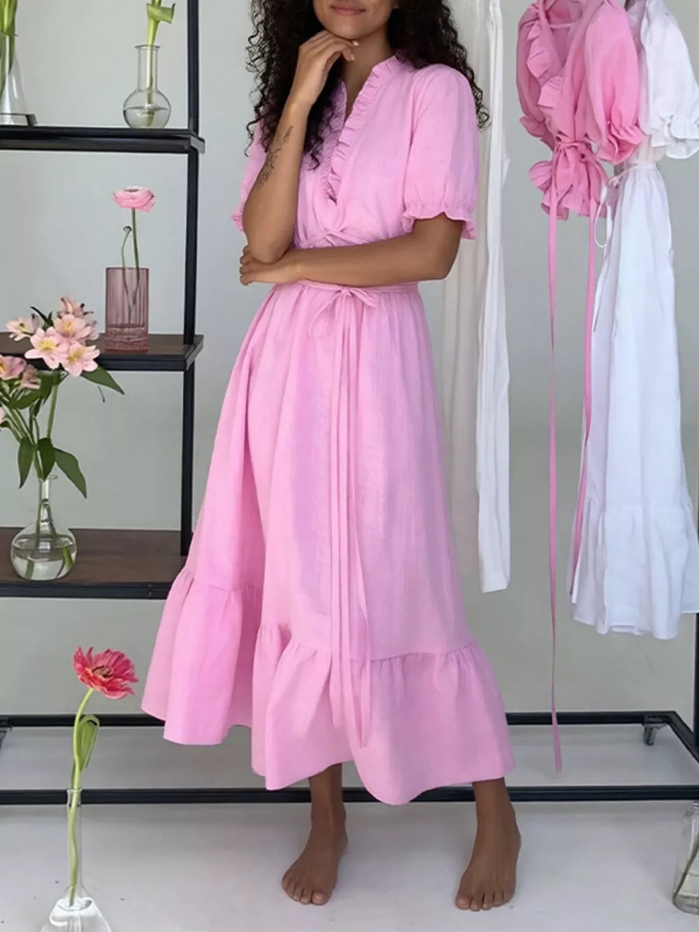 white maxi dress with tied and puff sleeve