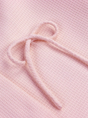 Pink textured knit top with drawstring detail