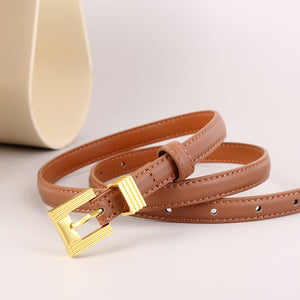 Skinny brown leather belt with gold buckle and adjustable holes