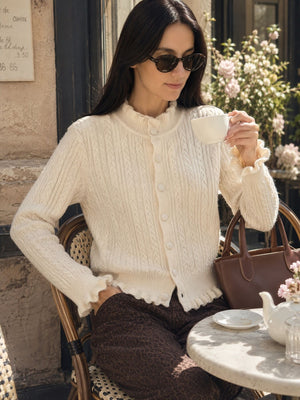 Gray cardigan featuring cable-knit and cable knit