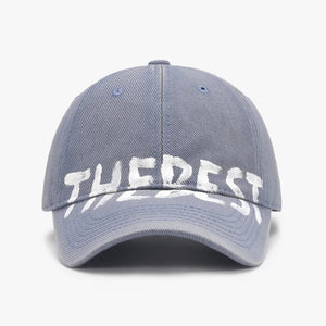 Dusty Blue textured denim baseball cap with white graphic text.