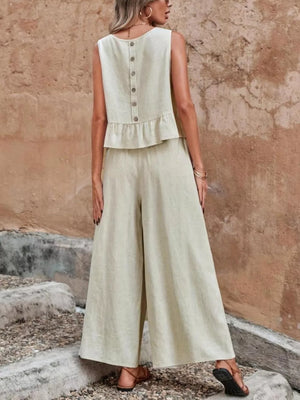Beige ruffled peplum top with button back and wide-leg pants set