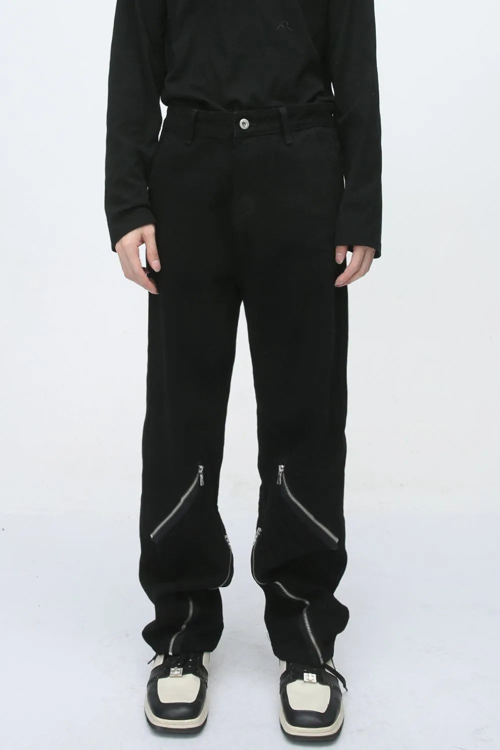 Black straight leg jeans with zip detail at the ankle