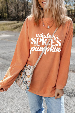Textured graphic crewneck pullover in sherbet orange with white text.
