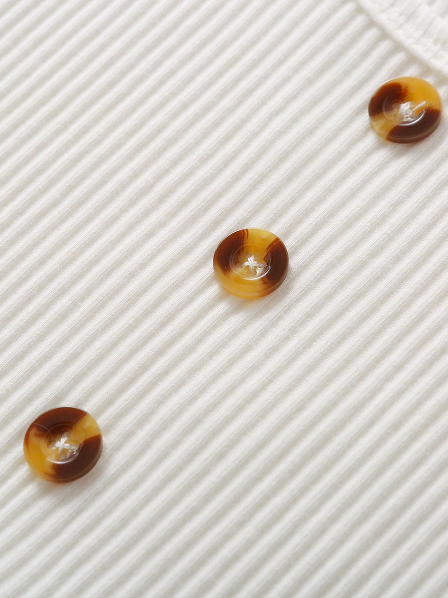 Toddler ribbed tank top in white with tortoise shell buttons