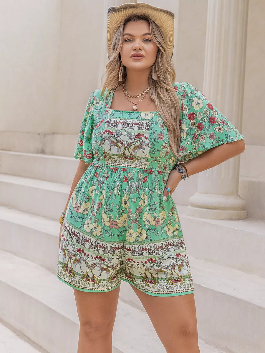 Plus-size green floral romper with square neck and cinched waist