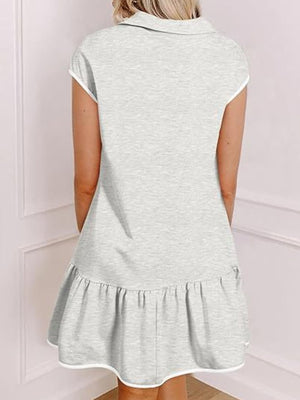 Light gray zip front cap sleeve ruffle dress with white trim