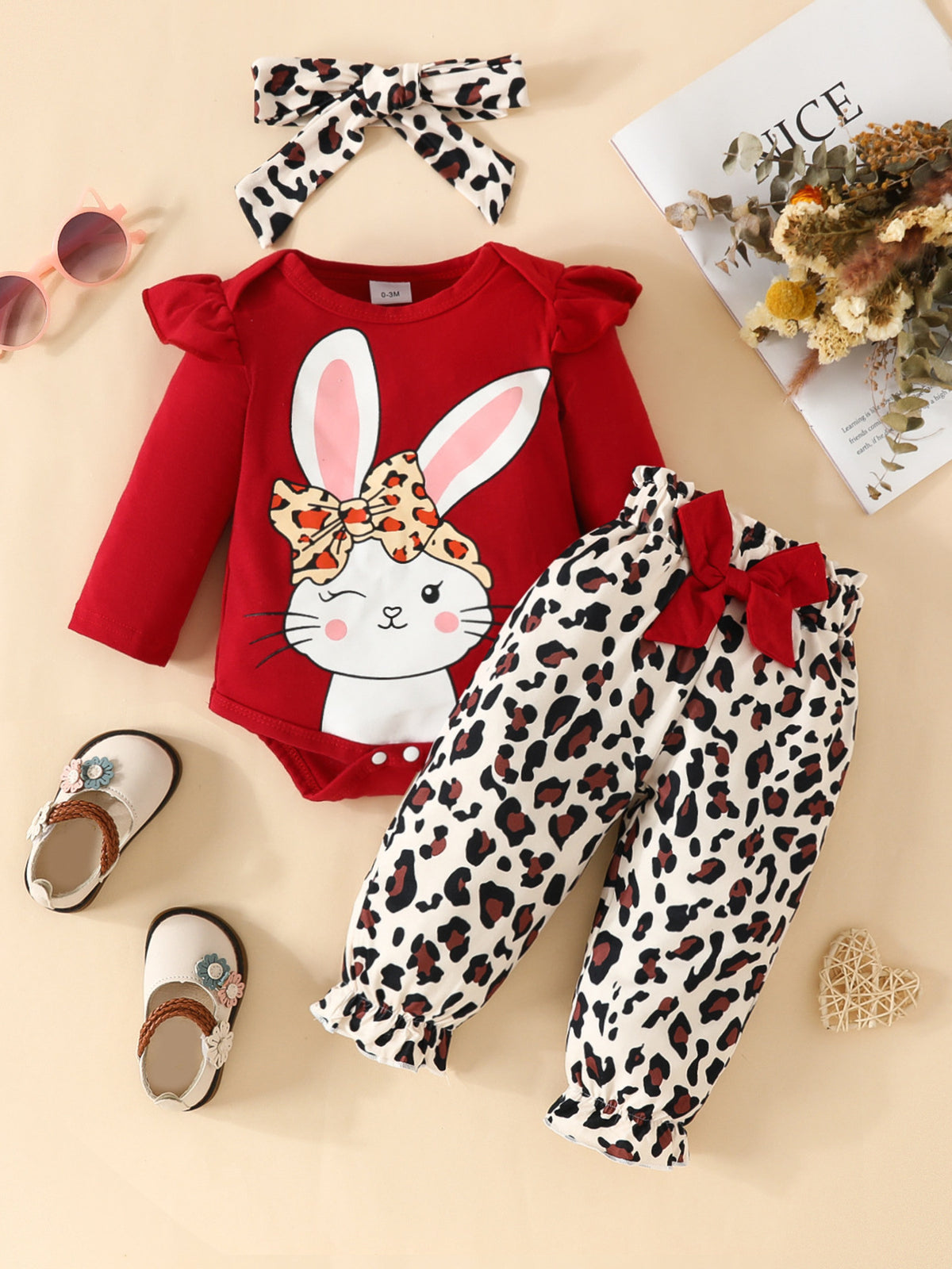 Red bunny bodysuit with leopard print bow and matching pants set.