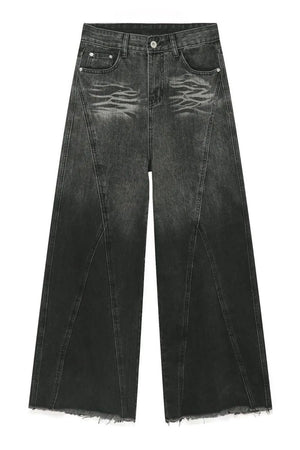 Dark denim palazzo trousers with a wide leg, distressed detailing, and frayed hem.