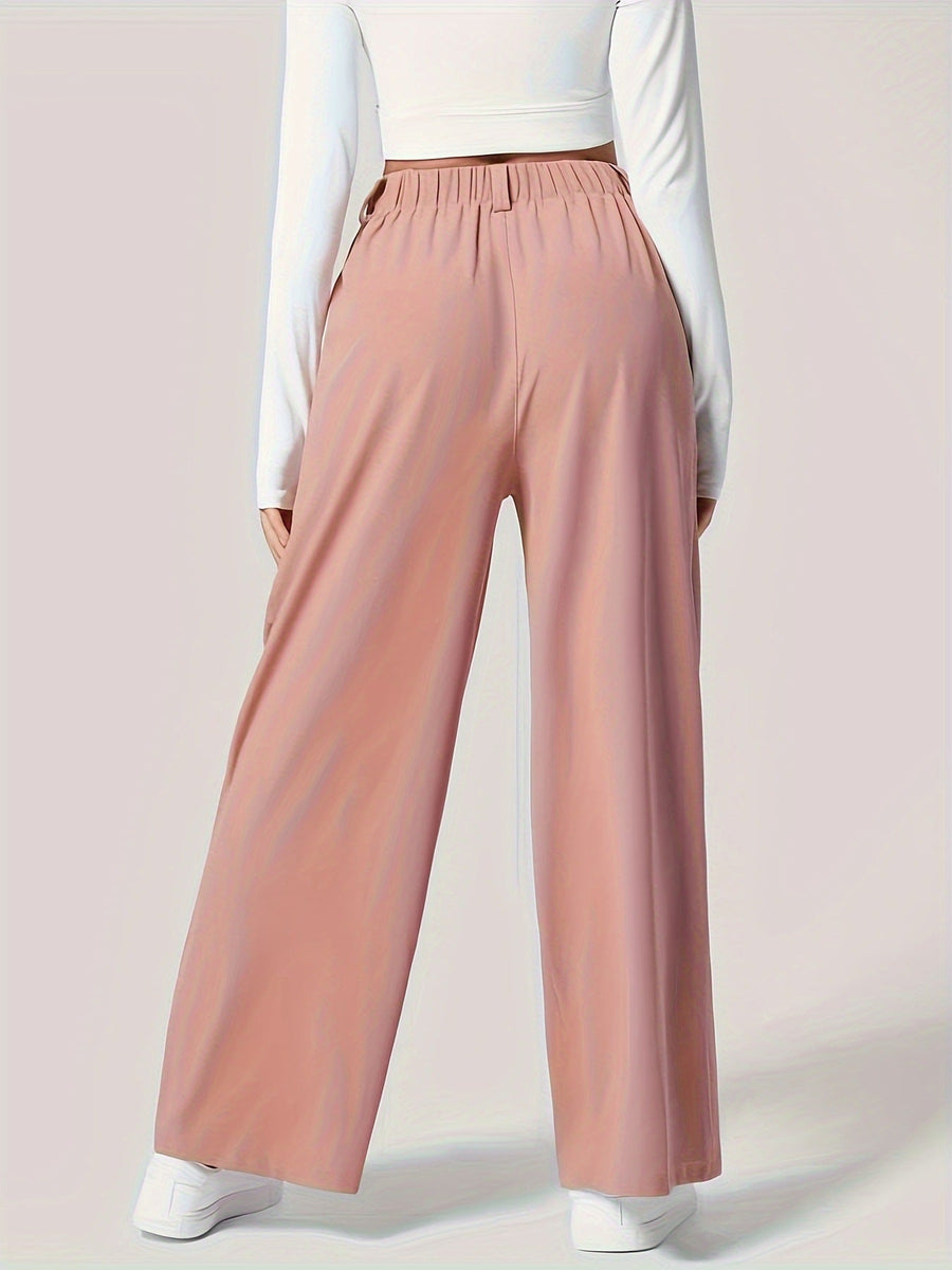 Pleated wide-leg trousers in pale blush with a high elasticated waist.