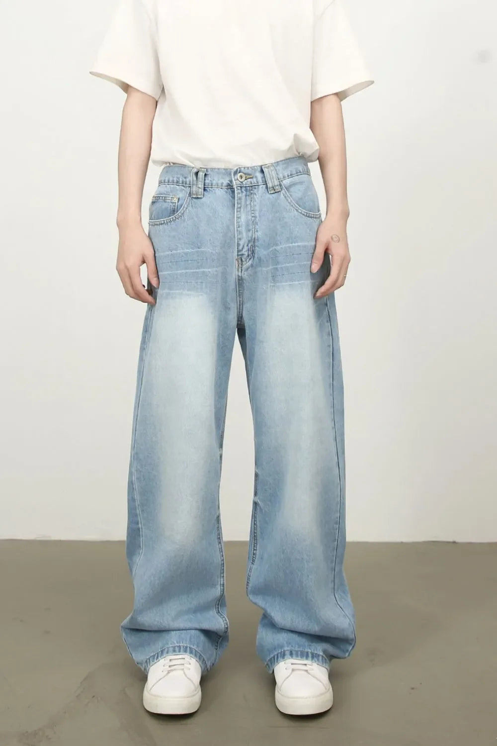 Baggy washed-effect palazzo jeans in medium blue denim with a relaxed fit.