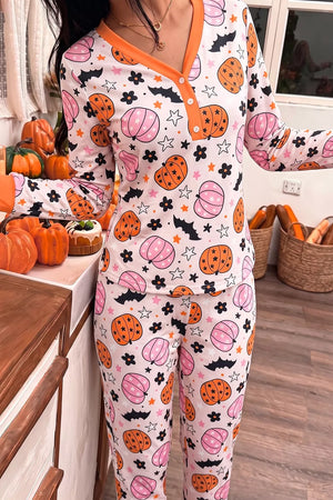 orange pajama set featuring buttoned placket and novelty print