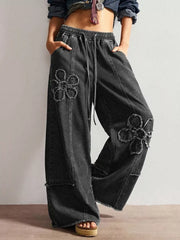 wide-leg jeans in Dark Blue with floral and distressed